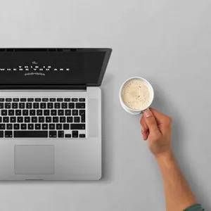 Laptop and a cup of coffee